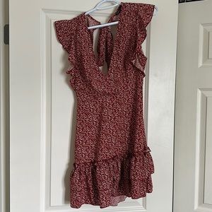 BRAND NEW short red romper size medium!